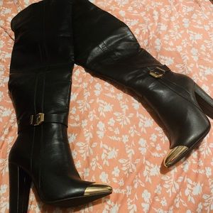 Black high heeled boots size 7